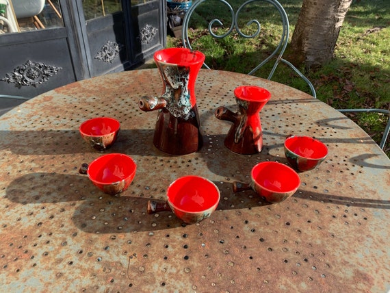 Chocolate or coffee service, composed of two chocolate pitchers and 5 cups, in washed enameled ceramic, signed VALLAURIS, vintage and design