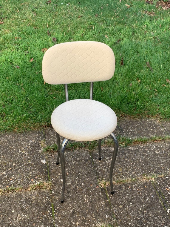 Small chair for bathroom or child, chrome legs and curved vintage.