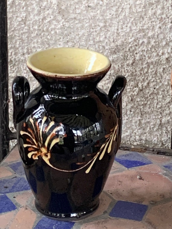 Amphora vase in black enameled ceramic and vintage hand-painted flowers