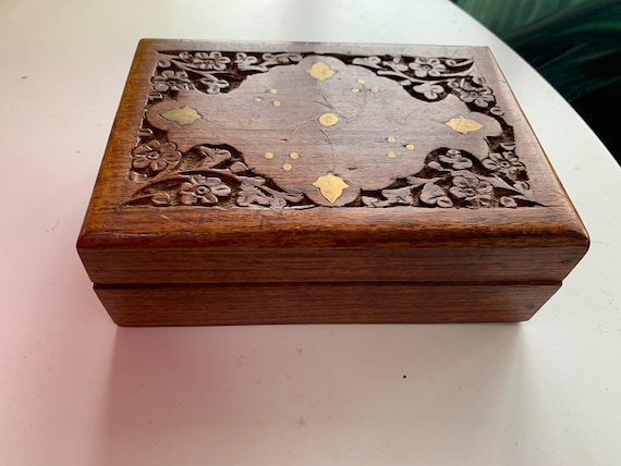 Carved wooden box with gilded brass inlays, foliage motifs, oriental and vintage