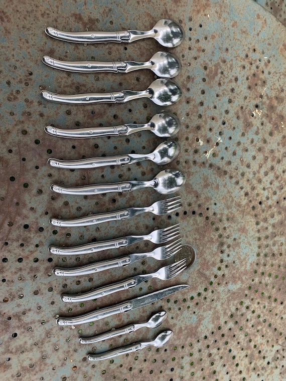 Set of 13 Laguiole production cutlery, stainless steel tempered with bee
