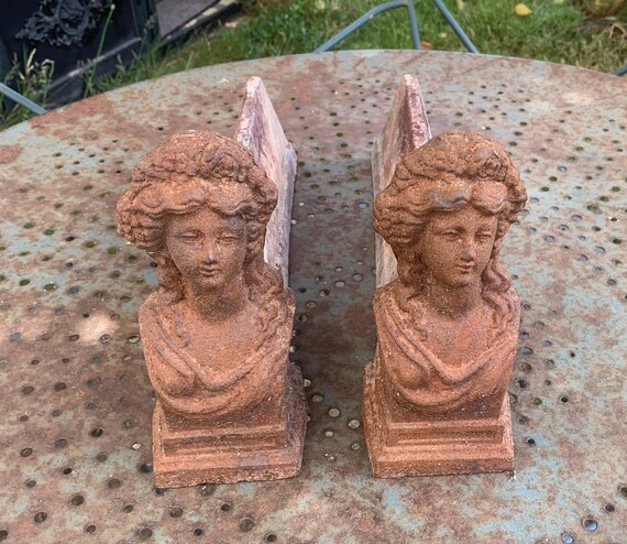 Pair of andirons, marmosets, bust of a woman, cast iron, Art Deco