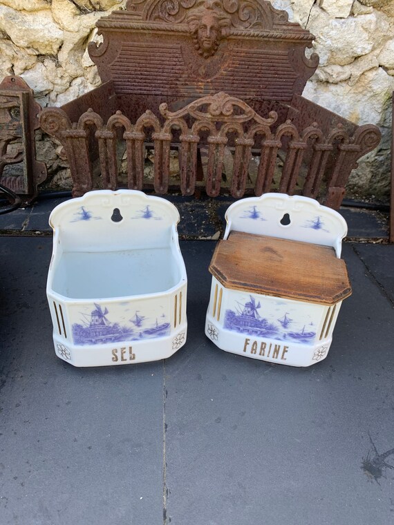 Two white earthenware pots with a pattern of blue windmills and golden borders, Made in Czechoslovakia, art deco.
