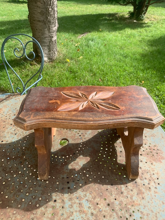 Chiseled and varnished wooden bench, mountain chalet decoration, old