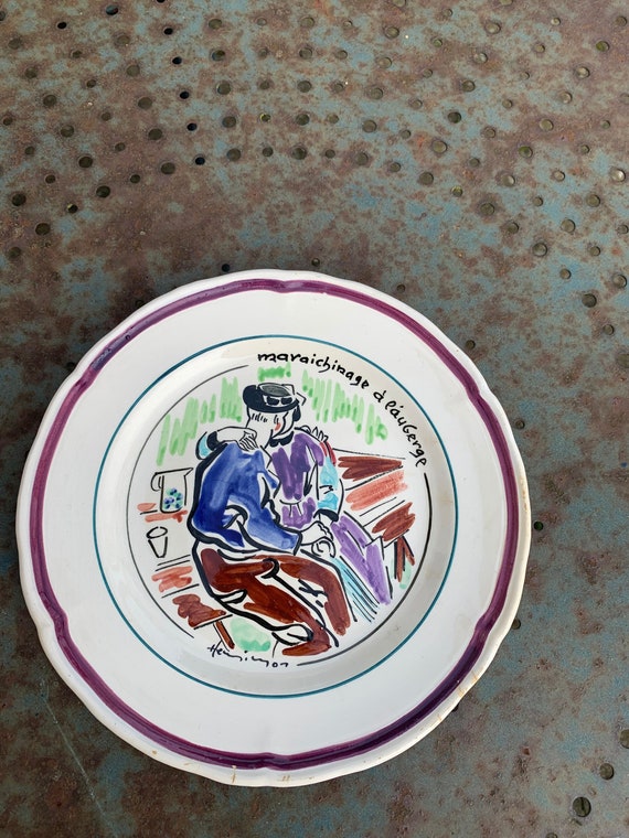 Collectible plate painted by Henry Simon, market gardening at the inn, in enameled ceramic, signed, MBFA, St jean de Monts, Sam10