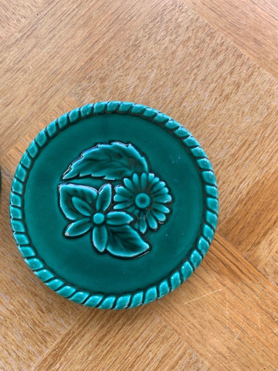 Two coasters in green enamelled ceramic, barbotine, vintage floral pattern 1950