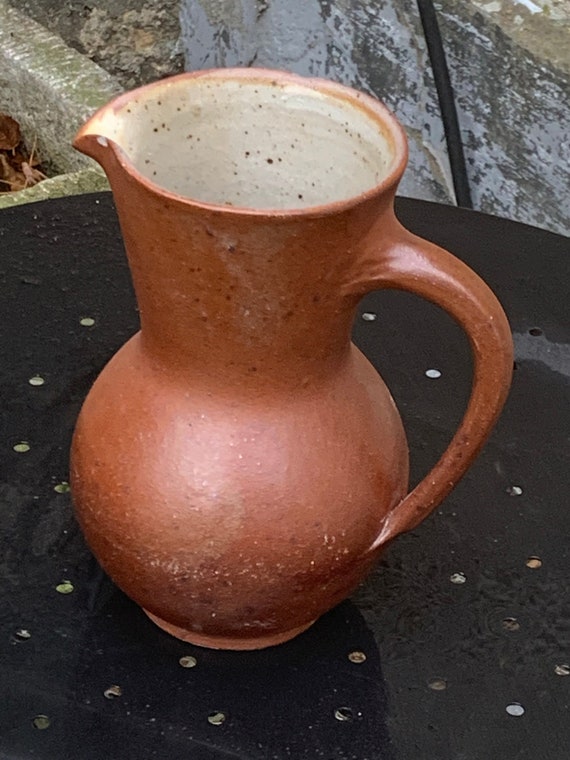 Pitcher, decanter, jug in old, vintage and design gres, interior in artisanal beige glazed gres, handmade