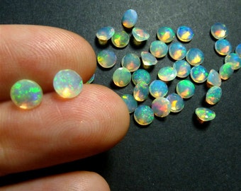 25 AAA Ethiopian Opal Gemstones: 2mm Faceted Round Loose Opals