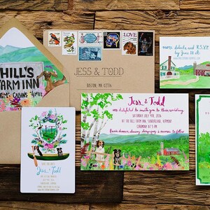 May include: A set of watercolour wedding invitations with a rustic theme. The invitations feature a green and brown colour scheme with illustrations of a cabin, mountains, and flowers. The text on the invitations reads "Hill's Farm Inn", "Jess & Todd", and "You're invited to celebrate with Jess & Todd".