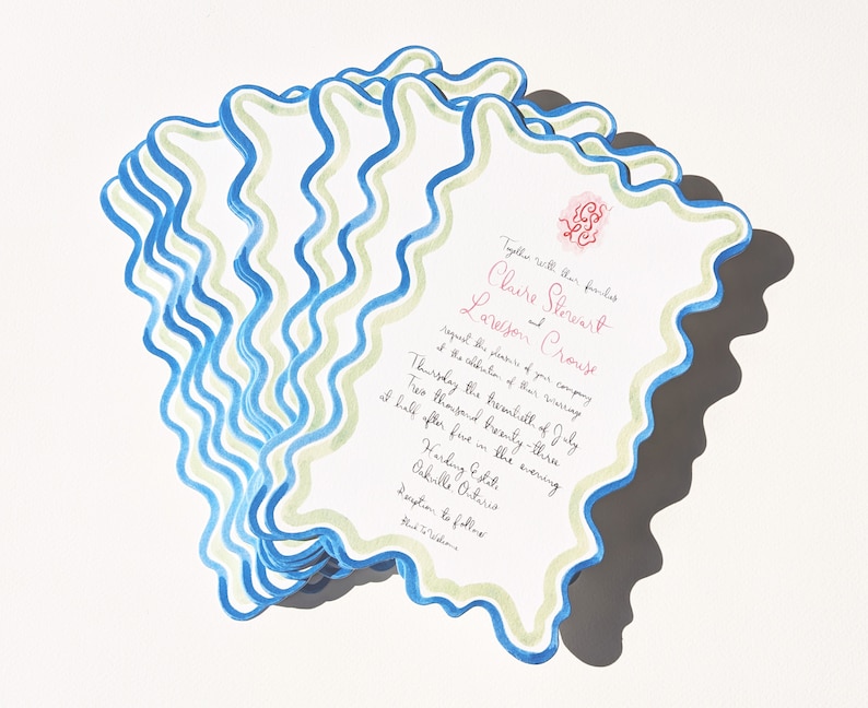 May include: A wedding invitation with a blue and green wavy border. The invitation is for Claire Stewart and Lavesson Crouse, and it is set for Thursday, the fourteenth of July, at half past five in the evening at Harking Estate, Oakville Ontario.