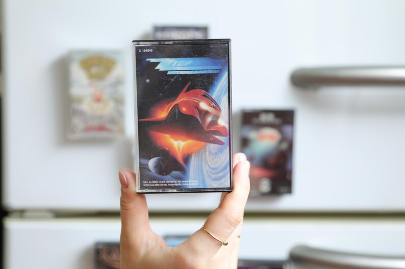 vintage 1980's 1990's and 2000's
 rock band cassette tapes turned refrigerator art magnet