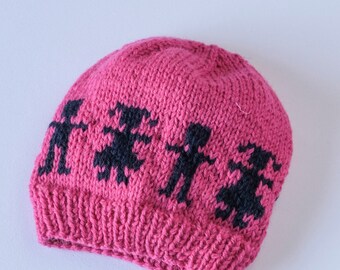 Girl beanie with dancing mini dolls