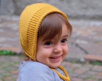 Yellow bonnet hand knit with pure new wool