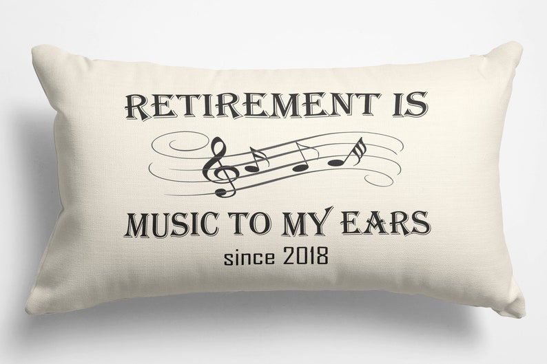 May include: A white throw pillow with the text "Retirement is music to my ears since 2018" and a musical note design.