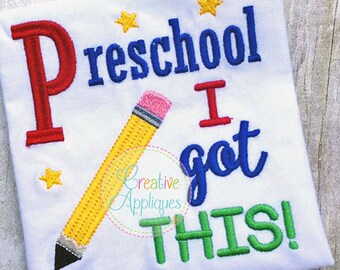 May include: A white t-shirt with the text "Preschool I got THIS!" in blue, red, and green. A yellow pencil with a pink eraser is next to the text.