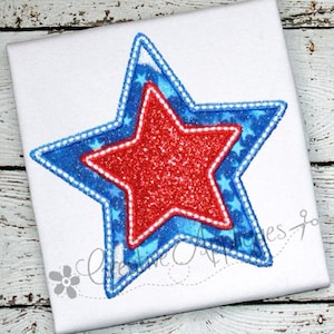 May include: A red and blue star with a white outline. The star is layered with a smaller red star inside of a larger blue star.