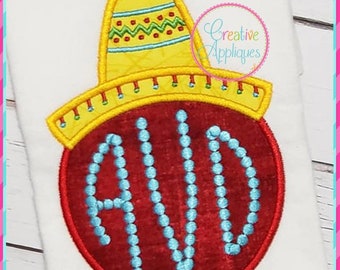 May include: Embroidered applique design featuring a red circle with the letters "AVD" in blue beads, topped with a yellow sombrero with red and green trim.