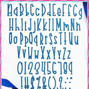 May include: A blue alphabet and number font with a handwritten style. The font includes uppercase and lowercase letters, numbers 0-9, and punctuation marks. The font is available in 14 sizes ranging from 0.75 inches to 4 inches.