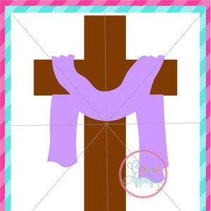 May include: A brown wooden cross with a purple scarf draped over it. The text "CUTTING FILE" is at the bottom of the image.