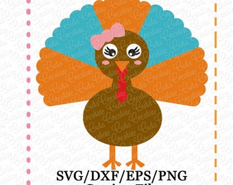May include: A brown turkey with a blue and orange fan-shaped tail. The turkey has a pink bow on its head and large, black eyes.