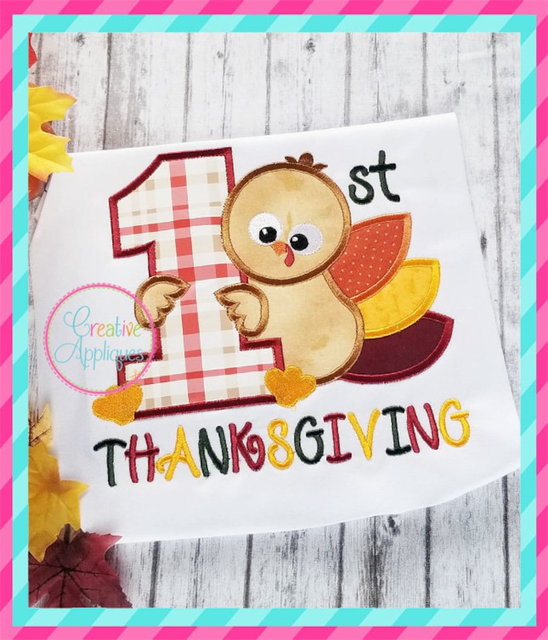 May include: Embroidered design featuring a plaid number one, a cartoon turkey, and the text "1st Thanksgiving".