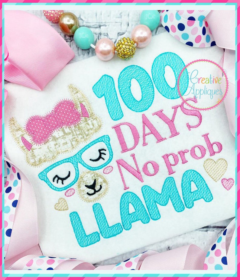 May include: A white shirt with a turquoise blue llama and the text "100 Days No Prob Llama" in pink and turquoise blue. The llama has a pink bow and gold glitter glasses.