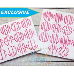 May include: Two white fabric squares displaying pink embroidered bubble letters of the alphabet. The top left corner of the image has a blue banner that says "CA EXCLUSIVE". The bottom right corner has the text "Creative Appliques".