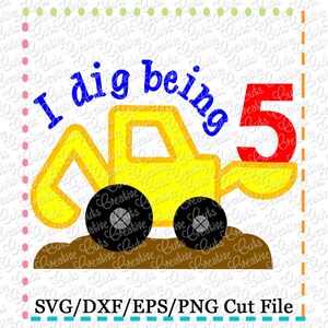 May include: A yellow toy construction vehicle with a black tire and a red number 5. The vehicle is digging into brown dirt. The text "I dig being 5" is written in blue letters above the vehicle.