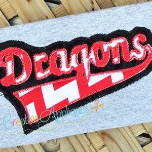 May include: Red and white embroidered patch with the word "Dragons" in a black outline. The patch is on a grey fabric background.