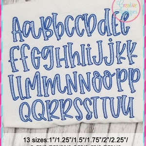 May include: A set of uppercase letters in a blue cursive font, with 13 different sizes ranging from 1 to 4 inches. The letters are displayed on a white background.