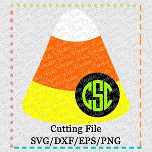 May include: A yellow, orange and white candy corn with a black circle containing a green monogram "GSC" in the centre. The candy corn is a popular Halloween decoration.