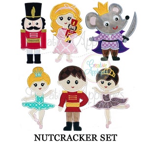 May include: Embroidered patches featuring characters from the Nutcracker ballet. Includes a nutcracker soldier, a ballerina, a prince, a mouse king with a sword, and a girl holding a nutcracker. The text "NUTCRACKER SET" is at the bottom.