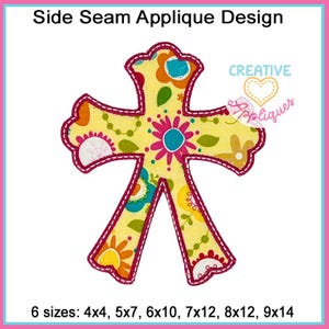 May include: A yellow cross with a floral pattern and pink, blue, and yellow accents. The cross is outlined in red and has a side seam applique design. The image includes the text "CREATIVE Appliques" and "6 sizes: 4x4, 5x7, 6x10, 7x12, 8x12, 9x14".