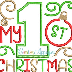 May include: Green, red, and brown embroidered design with the text "My 1st Christmas".