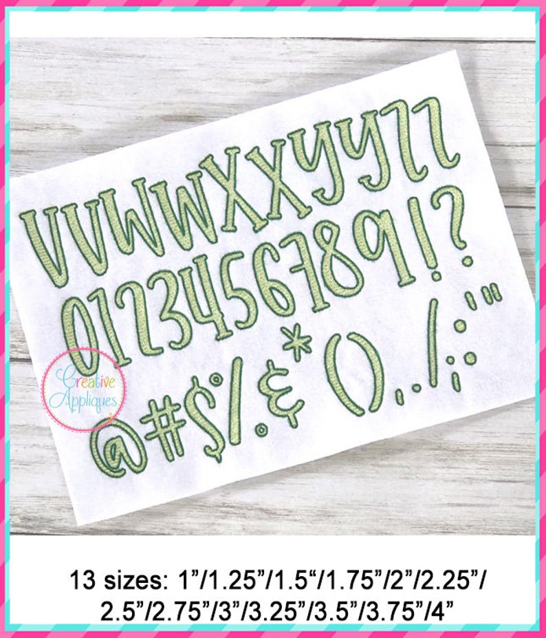 May include: A set of green embroidered letters, numbers, and symbols in a handwritten font style. The letters include V, W, X, Y, Z, and the numbers include 0, 1, 2, 3, 4, 5, 6, 7, 8, 9. The symbols include @, #, $, %, &, *, (, ), ., /, !, and ?. The text below the embroidered letters, numbers, and symbols reads "13 sizes: 1"/1.25"/1.5"/1.75"/2"/2.25"/2.5"/2.75"/3"/3.25"/3.5"/3.75"/4"