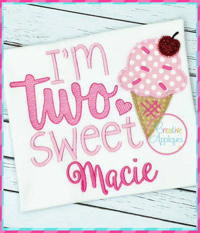 May include: Pink and white embroidered design on a white shirt that says "I'm two sweet Macie" with a pink and white ice cream cone graphic.