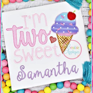 May include: Embroidered design featuring the text "I'm two sweet Samantha" with a pink heart and a purple and blue ice cream cone with a red cherry on top.
