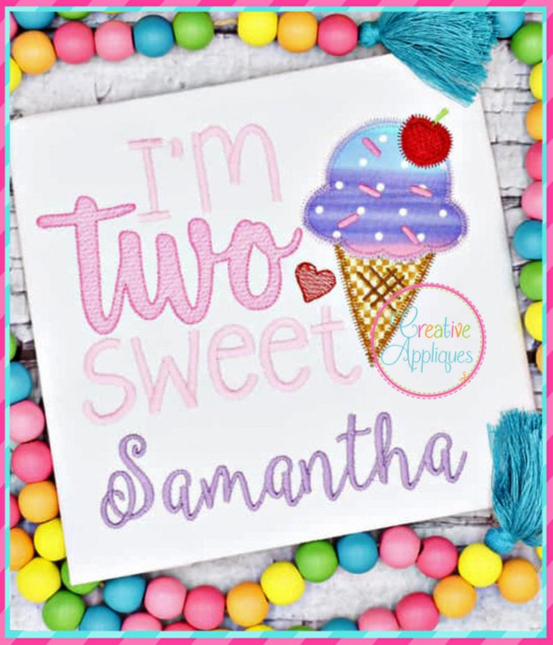 May include: Embroidered design featuring the text "I'm two sweet Samantha" with a pink heart and a purple and blue ice cream cone with a red cherry on top.