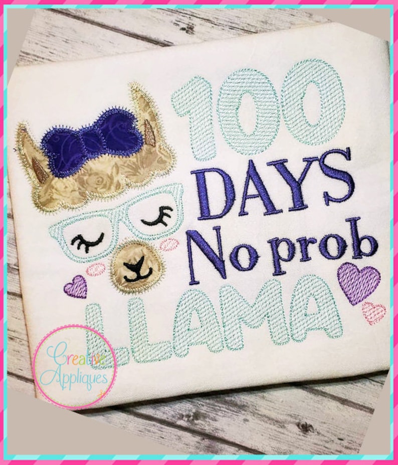 May include: Embroidered design featuring a llama with a purple bow, glasses, and hearts. The text "100 Days No Prob Llama" is stitched in turquoise and purple.