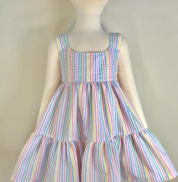 Girls rainbow colors seersucker dress, attached sash, ties in back for better fit, pastel stripes in blue, yellow, pink, white, 3T 4T, 5T,
