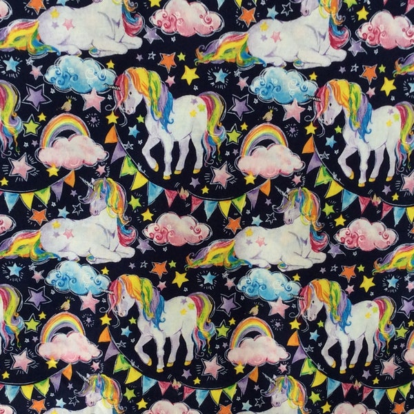 Majestic unicorns cotton fabric by third, half yard, black background, rainbows stars clouds, pennant flags, white pink