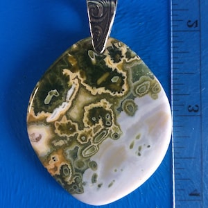 Translucent 7th vein Ocean Jasper drilled pendant