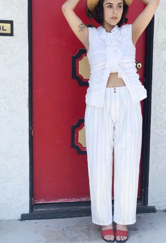 green and white striped trousers