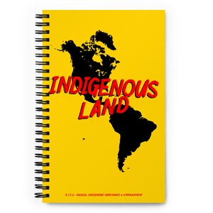 May include: A yellow spiral notebook with a black silhouette of North and South America. The text "Indigenous Land" is in red letters. The bottom of the notebook says "R.I.S.E.: Radical Indigenous Survivance & Empowerment."