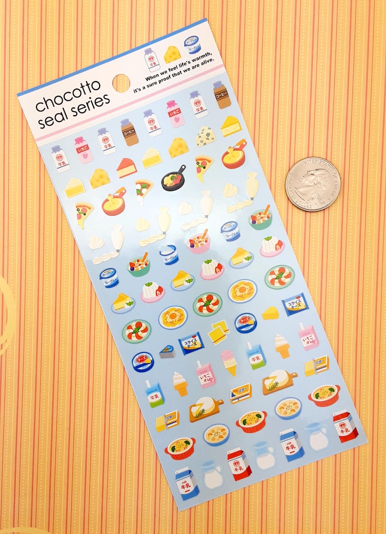 May include: A sheet of colorful stickers featuring various food items, including cheese, pizza, ice cream, and desserts. The stickers are on a blue background with white borders. The text "chocotto seal series" is printed in black at the top of the sheet. The text "When we feel life's warmth, it's a sure proof that we are alive." is printed in black at the top of the sheet.