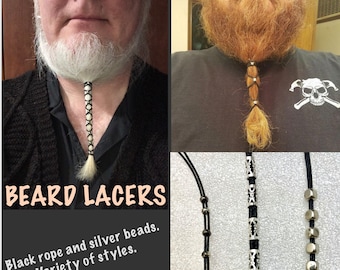 Baardhaarlacers. Zwart met zilverkleurige kralen. Veel ontwerpen om uit te kiezen. Zwart touw, baarden, dreadlocks, haar.