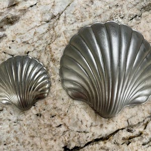 Concha de mar de metal