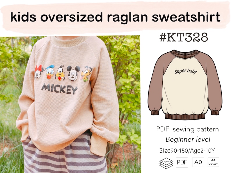 May include: A beige raglan sweatshirt with a Mickey Mouse print and the text "MICKEY". The sweatshirt is oversized and has a brown and beige color scheme. The image also shows a line drawing of a similar sweatshirt with the text "Super baby" on the front.