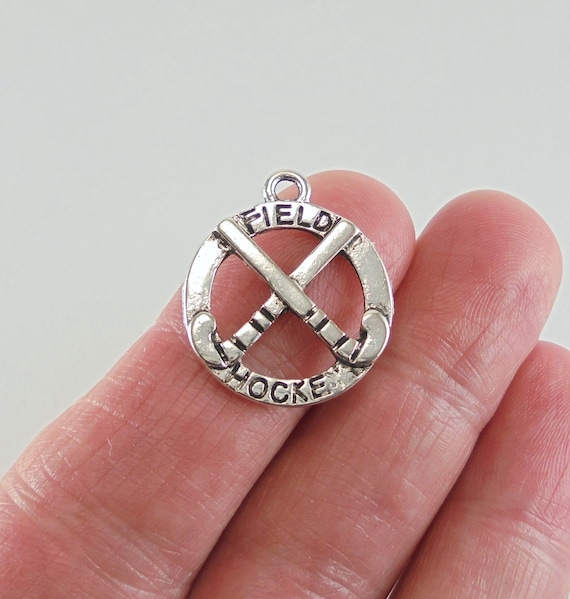 6 Field hockey charms antique silver tone SP223