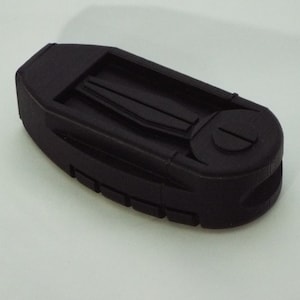 May include: A black multi-tool with a folding blade and other tools. The tool has a textured grip and a small hole for attaching a lanyard.